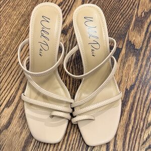 Wild Pair Nude Strappy Slide Heels